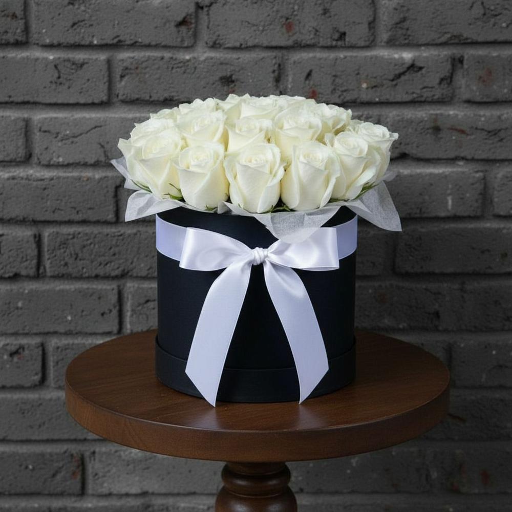 Цветочная композиция из Розы в шляпной коробке в Юго-Камский